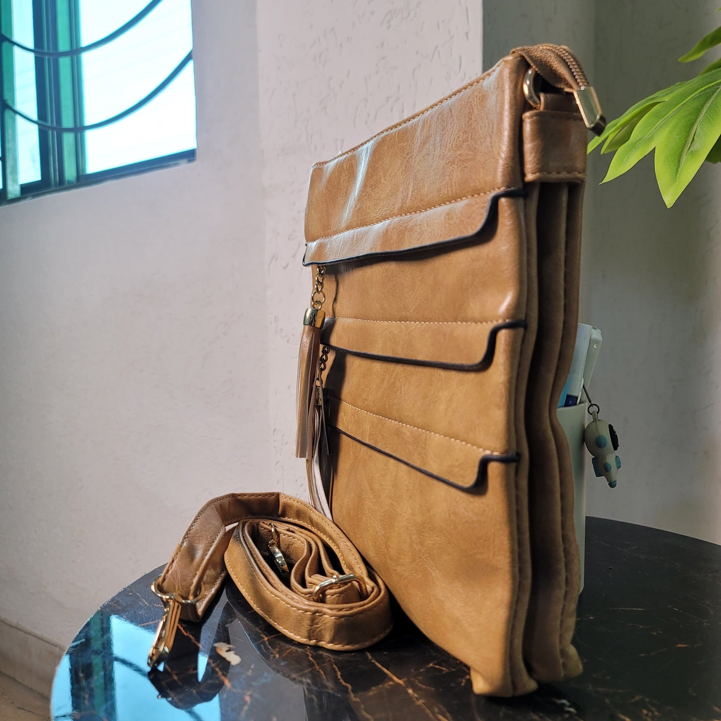 Versatile Crossbody Bag with Tassel