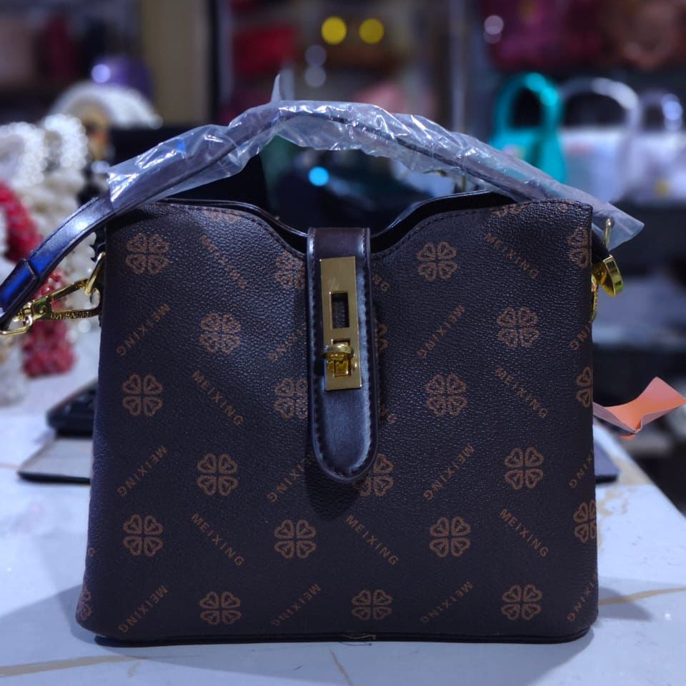 Elegant Tan Mini Top Handle Bag with Gold Hardware