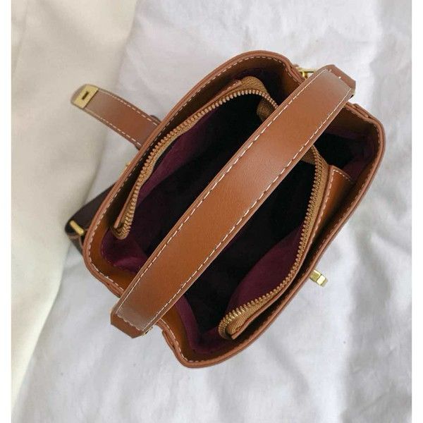 Elegant Tan Mini Top Handle Bag with Gold Hardware